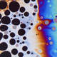 This image demonstrates the behavior of soap bubbles to study the formation of foams. According to the EPSRC website, it was “taken using a highly customized set-up comprising two Quality Street biscuit tins, an oven tray, parts of a Tesco water bottle, a piece of transparency paper, Fairy Liquid, a builder’s lamp and a DSLR camera, a Nikon D500 with a 105mm VR macro lens.” By Li Shen - Imperial College London (Image via EPSRC)